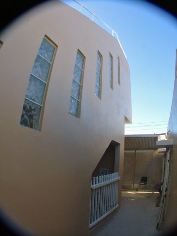 sideyardbetweengarageandhouse.jpg
